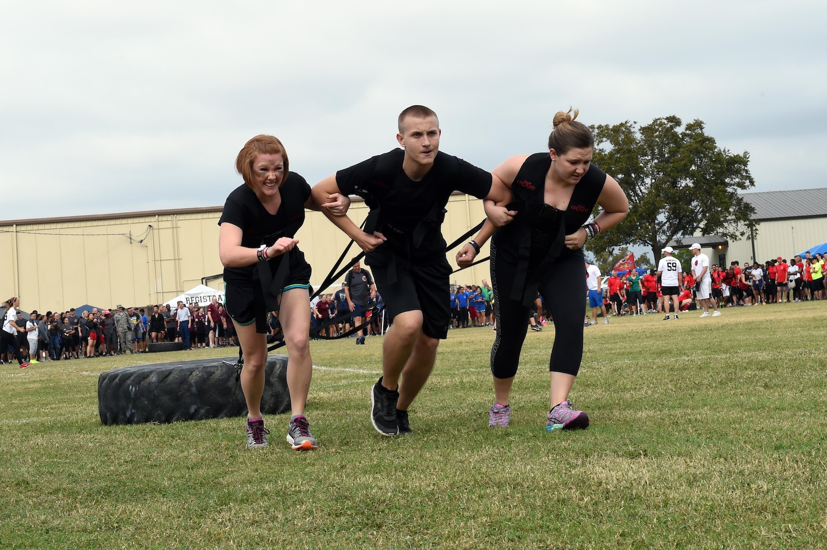 The 559th Medical Group team pulls a 150-pound tire during the ‘Dragula’ competition at the Warrior Medic Challenge on Joint Base San Antonio-Lackland, Texas, Nov. 4. Teams – working in trios – competed to be the first to drag the tire 600 feet. (U.S. Air Force photo/Staff Sgt. Jason Huddleston) 