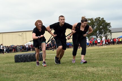 The 559th Medical Group team pulls a 150-pound tire during the ‘Dragula’ competition at the Warrior Medic Challenge on Joint Base San Antonio-Lackland, Texas, Nov. 4. Teams – working in trios – competed to be the first to drag the tire 600 feet. (U.S. Air Force photo/Staff Sgt. Jason Huddleston) 