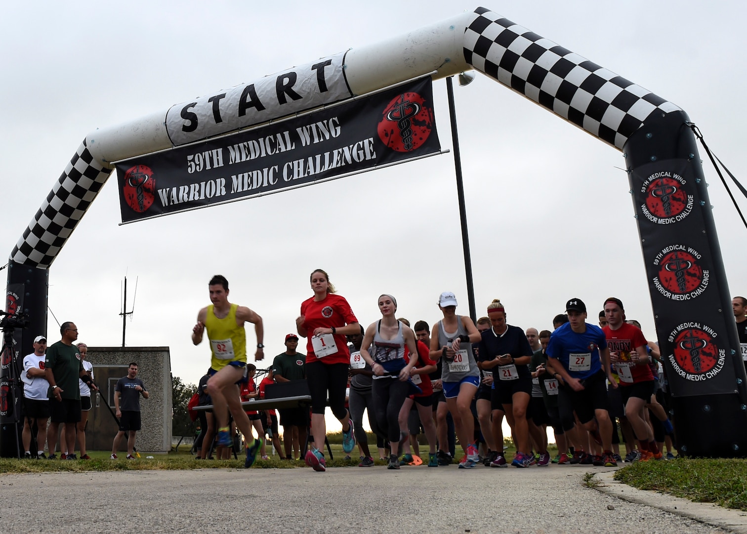 Runners kick off the Warrior Medic Challenge 9K run Nov. 4, 2016 at the Gillum Fitness Center and Sports Complex on Joint Base San Antonio-Lackland, Texas. The event also included a 5K and a fun run. (U.S. Air Force photo/Staff Sgt. Kevin Iinuma)