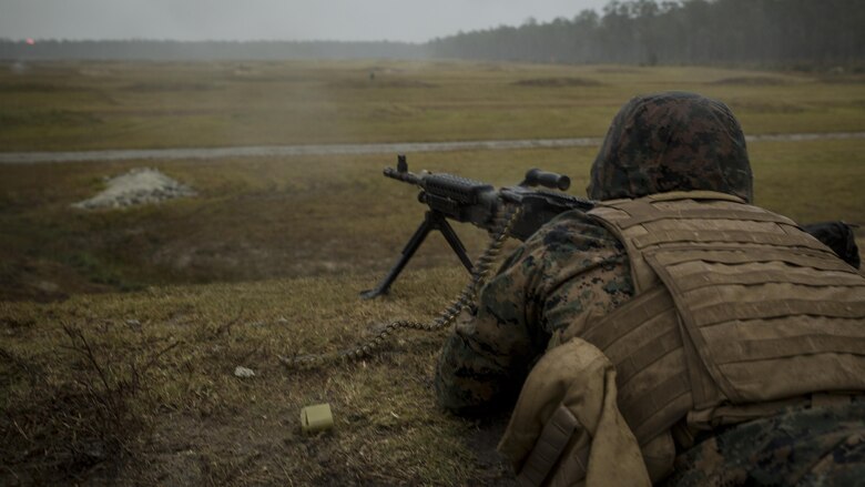 Lance Cpl. Juan Medellin, an engineer equipment operator with CLB 6, fires the M240B medium machine gun during a command post exercise at Camp Lejeune, N.C., Nov. 3, 2016. Combat Logistics Battalion 6 conducted the training in preparation for their Marine Corps Combat Readiness Evaluation. 