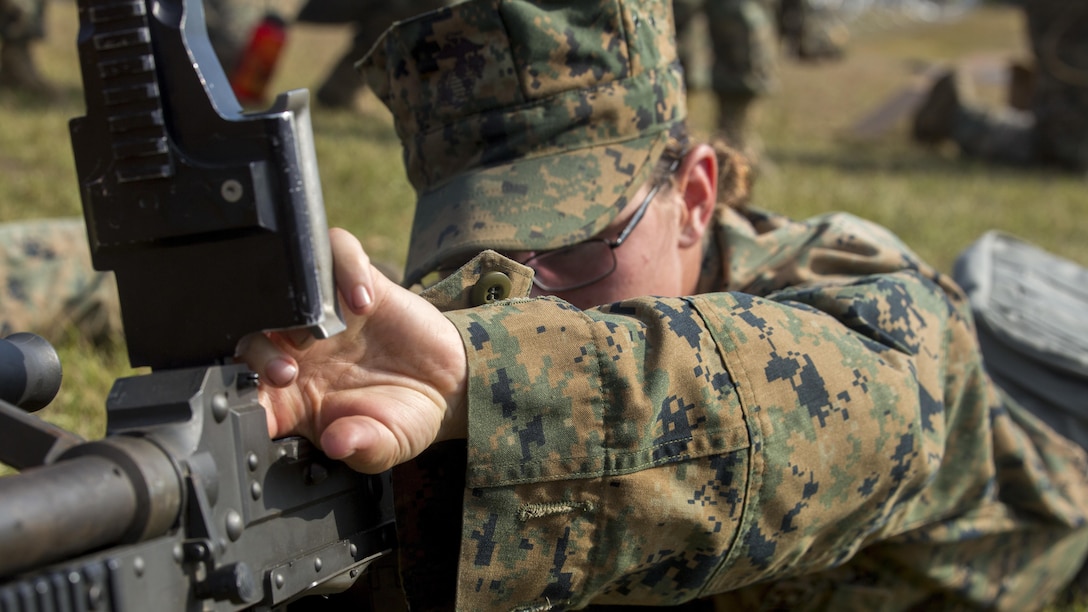 Pfc. Courtney Libra, an electrician with Combat Logistics Battalion 6, practices the proper misfire procedures on a M240B machine gun during a command post exercise at Bogue Marine Corps Auxiliary Landing Field, N.C., Nov. 3, 2016. Combat Logistics Battalion 6 conducted the training in preparation for their upcoming deployment Special-Purpose Marine Air Ground Task Force, Crisis Response-Africa.