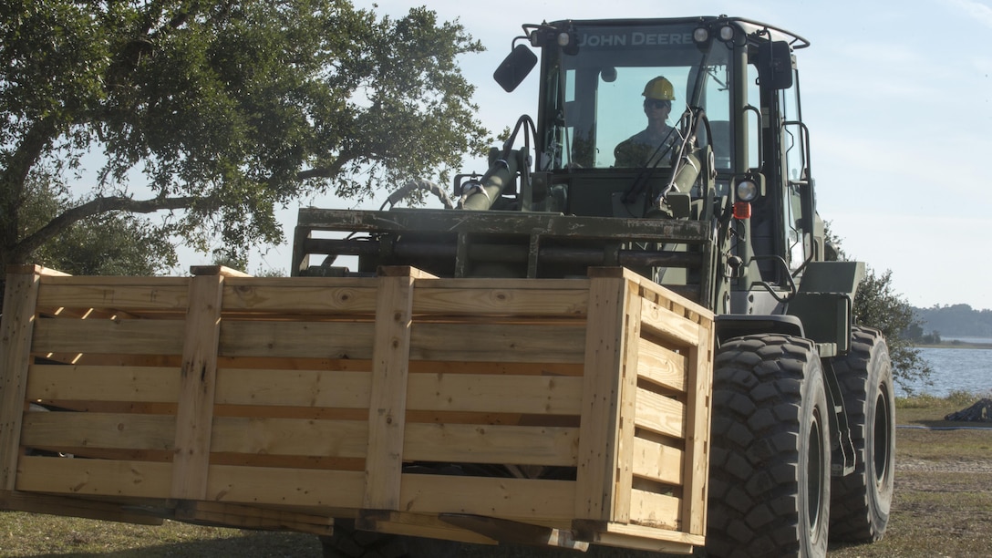 A Marine with Combat Logistics Battalion 6 assists in tearing down camp at the end of a command post exercise at Bogue Marine Corps Auxiliary Landing Field, N.C., Nov. 3, 2016. Combat Logistics Battalion 6 conducted the training in preparation for their Marine Corps Combat Readiness Evaluation. 