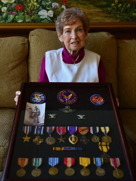 Gertrude Geyer-Dix, wife of retired Col. Gerald Johnson “Jerry” Dix, holds a shadowbox honoring his accomplishments in Sumter, S.C., Nov. 7, 2016. Dix became a colonel at the age of 27, served as the base commander at Shaw Air Force Base, S.C., and later as an advisor to the Royal Hellenic Air Force in Greece and the Colorado Air National Guard in Denver. (U.S. Air Force photo by Airman 1st Class Christopher Maldonado)