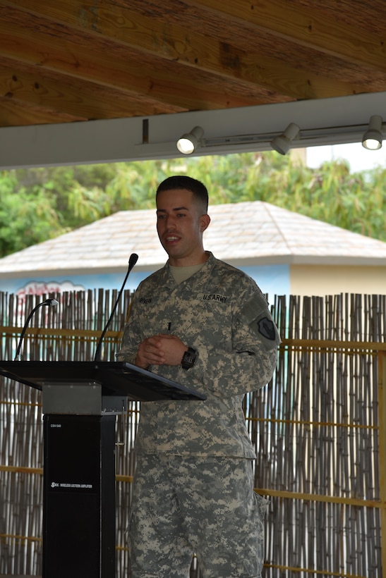 1st Lt. Eduardo Rivera address his Soldiers, friends, and family that attended a Farewell Ceremony for Army Reserve Soldiers from the 215th Military Police Company at the Japanese Garden in Ponce, Puerto Rico on November 7.