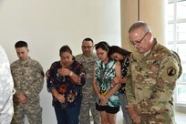 from the 215th Military Police Company said good-bye to their family and loved ones at the Luis Munoz Marin Airport in San Juan, Puerto Rico on November 8. Brig. Gen. Alberto C. Rosende, 1st Mission Support Command commanding general, reassured them that the Soldiers were ready for their mission and reminded the unit how important it is to stay engaged with their families.