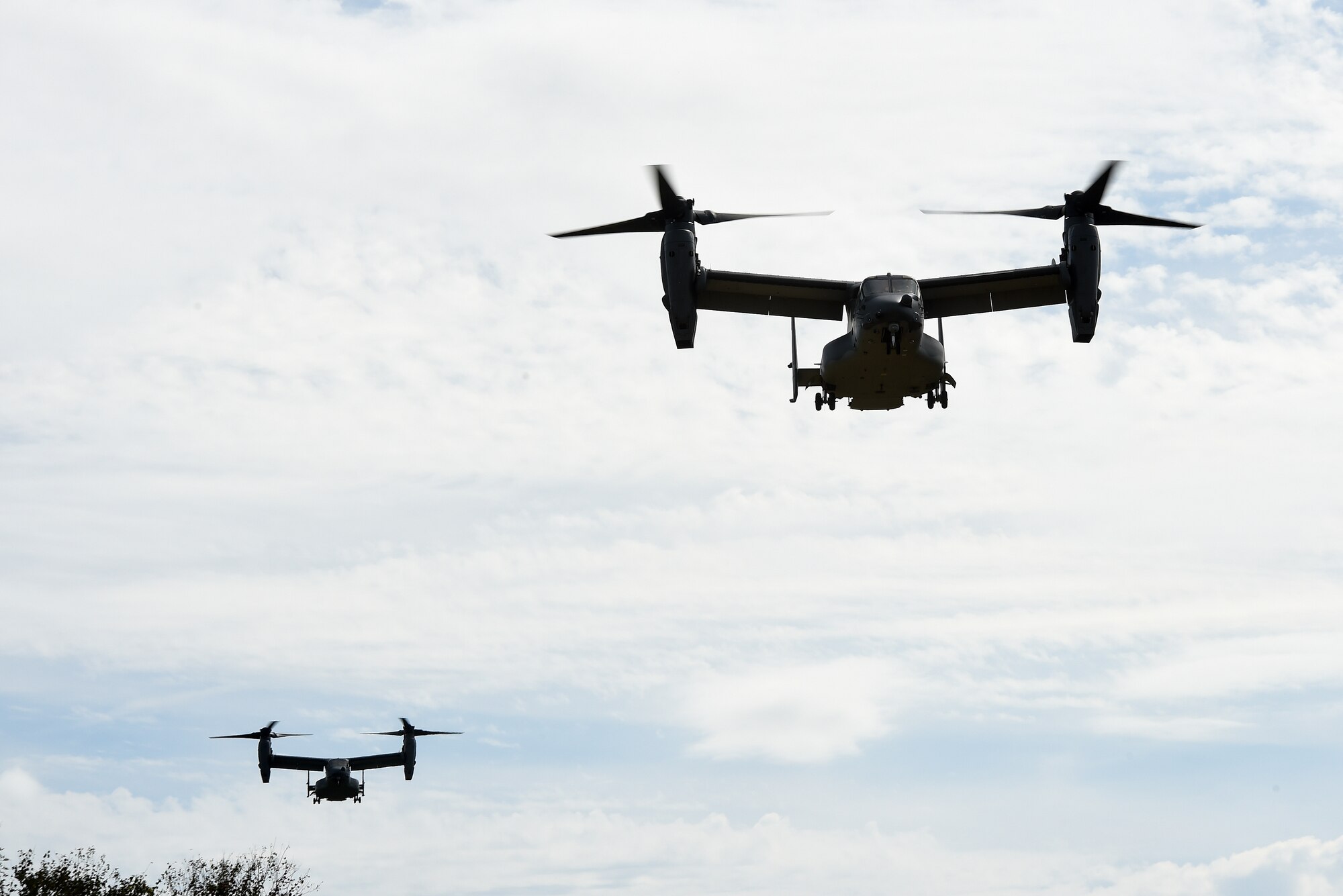 CV-22 Ospreys fly over Camp Shelby, Miss., during Task Force Exercise Southern Strike, Oct. 26, 2016. The CV-22 crews with the 8th Special Operations Squadron provided infiltration/exfiltration air support for Task Force Exercise Southern Strike. (U.S. Air Force photo by Senior Airman Jeff Parkinson)