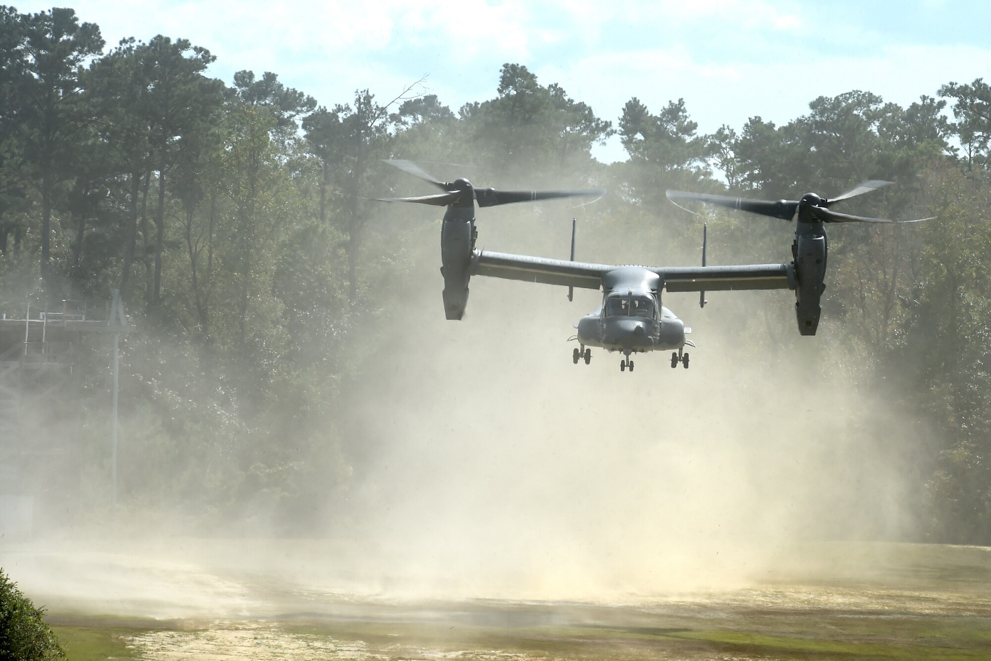 A CV-22 Osprey takes off over Camp Shelby, Miss., during Task Force Exercise Southern Strike, Oct. 26, 2016. The CV-22 crews with the 8th Special Operations Squadron provided infiltration/exfiltration air support for Task Force Exercise Southern Strike. (U.S. Air Force photo by Senior Airman Jeff Parkinson)