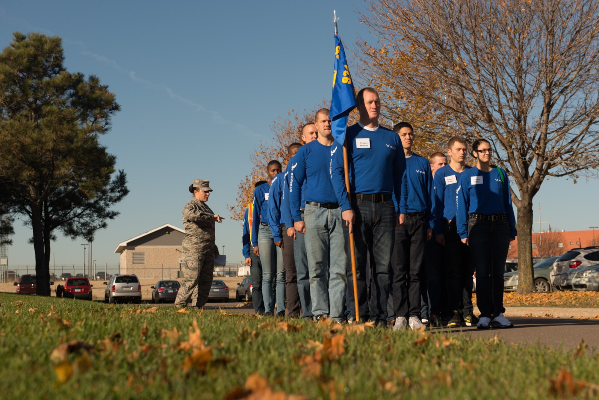 Master Sgt. Erica Hokkanen gives instructions to trainees as they stand at attention on November 5. (U.S. Air Force Photo by Tech. Sgt. Trevor Saylor)