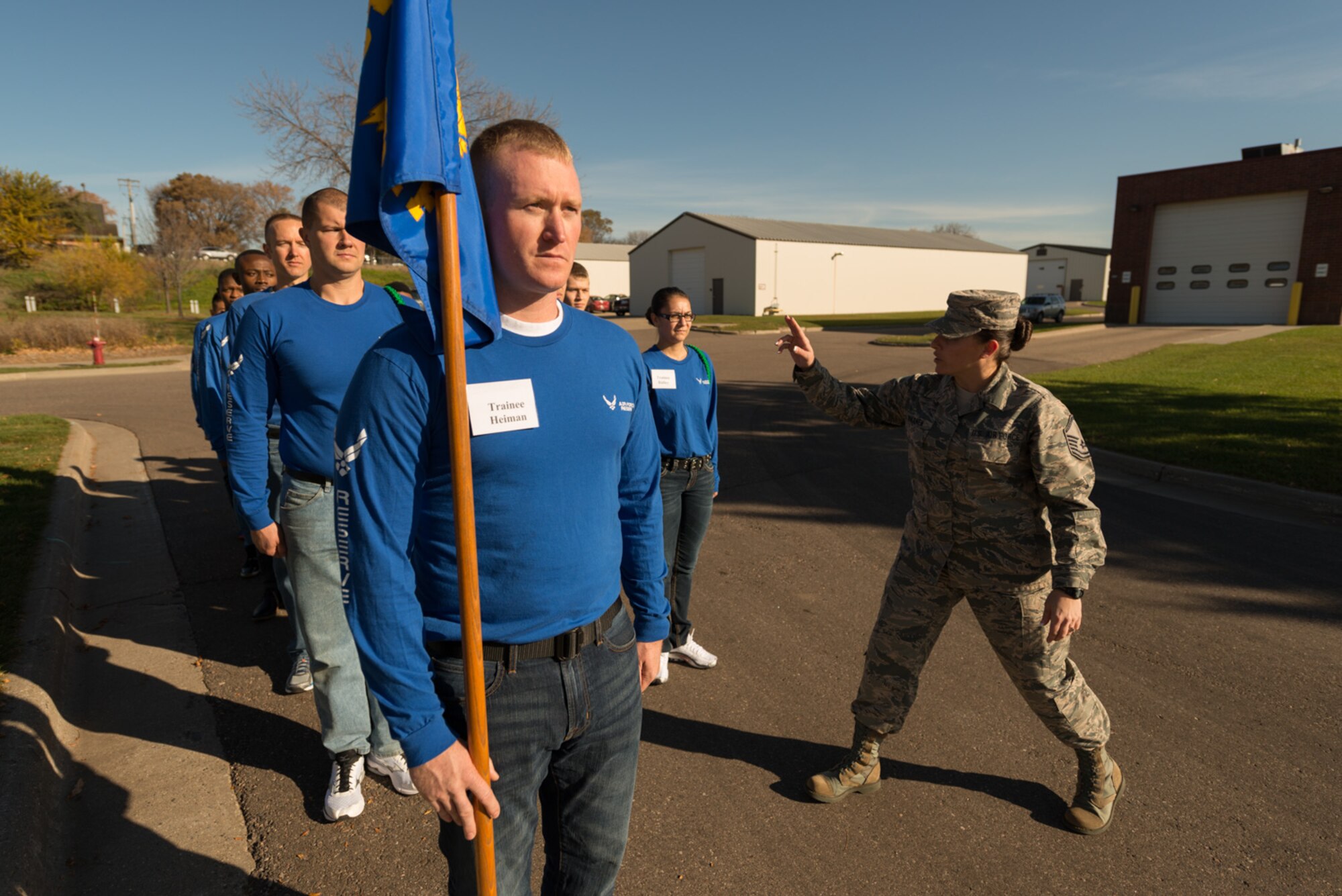 Master Sgt. Erika Hokkanen gives marching instructions to trainees as they stand at attention on November 5. (U.S. Air Force Photo by Tech. Sgt. Trevor Saylor)