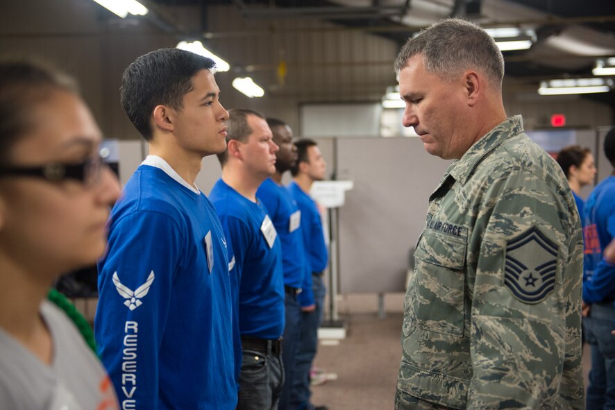 Senior Master Sgt. Thomas Schulte performs an open ranks inspection on trainees on Nov. 5. (U.S. Air Force Photo by Tech. Sgt. Trevor Saylor)