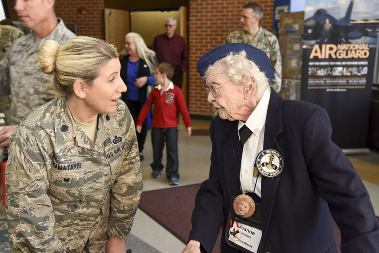 Ms. Jeanne Benedict, World War II U.S. Navy cartographer, speaks with U.S. Air Force Lt. Col. Alison Kamataris, 497th Intelligence, Surveillance, and Reconnaissance Group deputy commander, during her tour at Joint Base Langley-Eustis Nov. 8, 2016. Ms. Benedict is a veteran who served in the Navy as a photo interpreter and spoke with other Intel Airmen to teach them about how the intelligence community has evolved throughout the years. (U.S. Air Force photo by Tech. Sgt. Darnell T. Cannady)