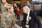 Ms. Jeanne Benedict, World War II U.S. Navy cartographer, speaks with U.S. Air Force Lt. Col. Alison Kamataris, 497th Intelligence, Surveillance, and Reconnaissance Group deputy commander, during her tour at Joint Base Langley-Eustis Nov. 8, 2016. Ms. Benedict is a veteran who served in the Navy as a photo interpreter and spoke with other Intel Airmen to teach them about how the intelligence community has evolved throughout the years. (U.S. Air Force photo by Tech. Sgt. Darnell T. Cannady)