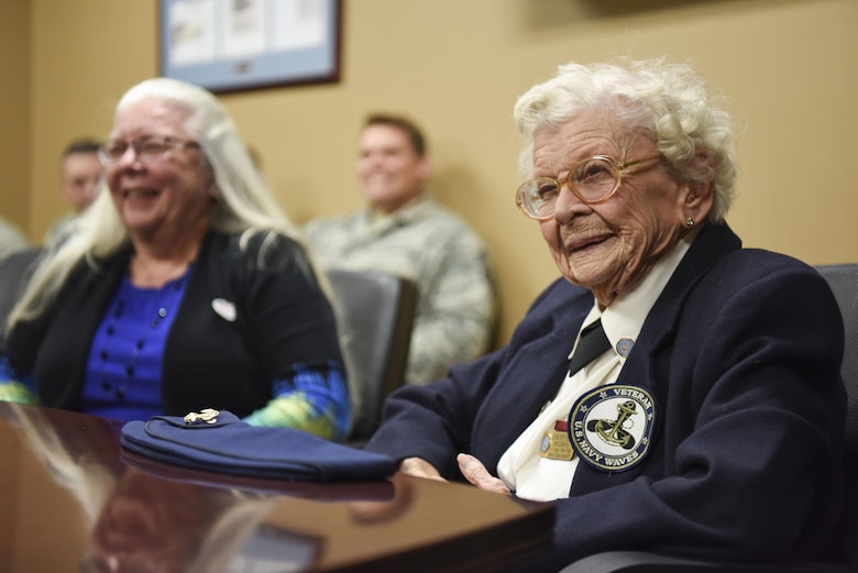 Ms. Jeanne Benedict, World War II cartographer, laughs as she shares her stories with the Airmen of the 497th Intelligence, Surveillance, and Reconnaissance Group during a tour at Joint Base Langley-Eustis Nov. 8, 2016. Ms. Benedict and her family was invited to visit the 36th Intelligence Squadron and 480th ISRW to pass on her experiences and knowledge as part of Veteran day. (U.S. Air Force photo by Tech. Sgt. Darnell T. Cannady)
