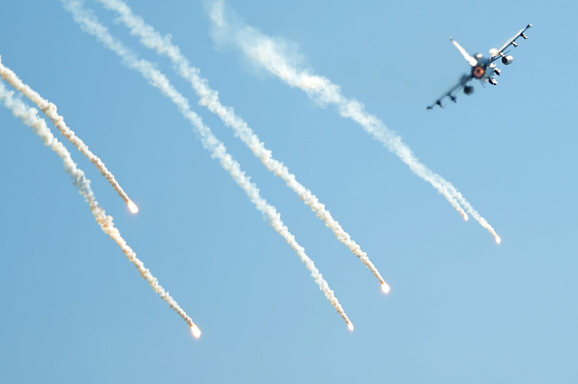 An F-16CM Fighting Falcon assigned to the 20th Fighter Wing at Shaw Air Force Base, S.C., launches flares during an East Coast Airpower Demonstration at Poinsett Electronic Combat Range, Wedgefield, S.C., Oct. 28, 2016. Flares are used by aircraft as a counter to heat-seeking missile targeting. (U.S. Air Force photo by Airman 1st Class Christopher Maldonado)  