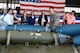 A U.S. Airman assigned to the 20th Fighter Wing briefs congressional staff members on different types of munitions during an East Coast Airpower Demonstration static displays tour at Shaw Air Force Base, S.C., Oct. 28, 2016. During their visit individuals had the opportunity to see the various weapons and munitions utilized by aircraft stationed at military installations along the East Coast. (U.S. Air Force photo by Airman 1st Class Christopher Maldonado)