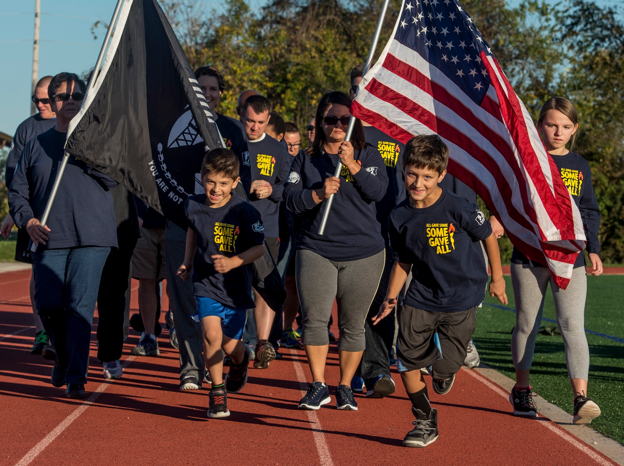 The 7th annual Air Force Sergeants Association Veteran's Vigil run was Nov. 4 and 5, 2016, at the James Gym Track, Scott Air Force Base, Illinois. Master Sgt. Gregory Kuhse was the honoree, who was killed in a British Puma Mk2 helicopter crash in Afghanistan last year. He was a Kalamazoo, Michigan, native and a father of four, with 19 years of service in the United States Air Force. He was assigned to the 3rd Manpower Requirements Squadron at Scott AFB. (U.S. Air Force photo by Staff Sgt. Jodi Martinez)
