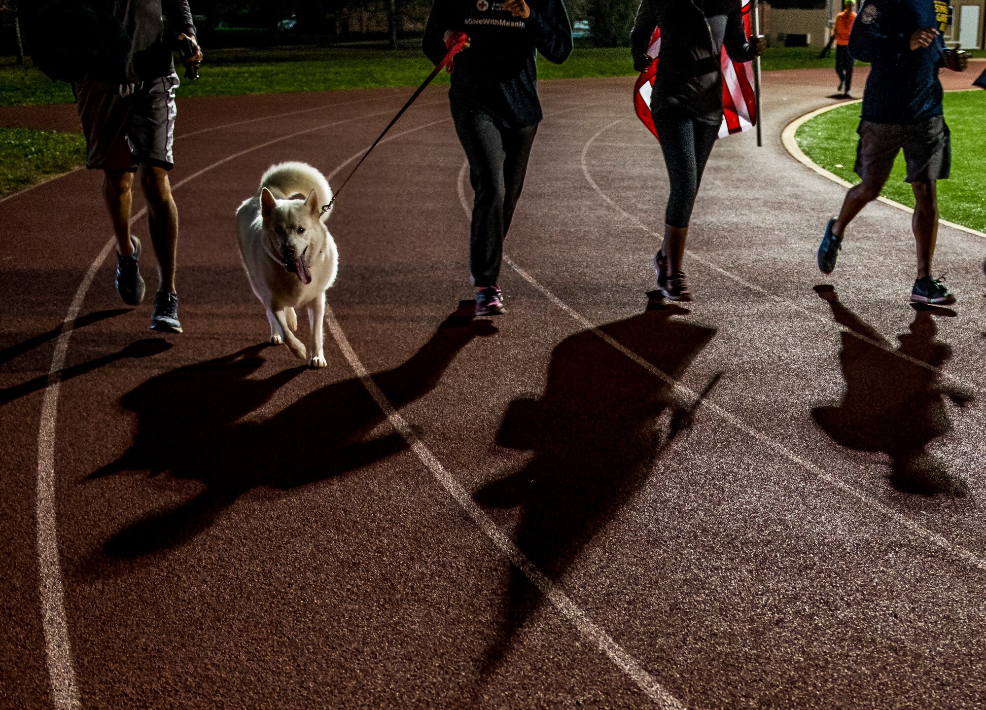 The 7th annual Air Force Sergeants Association Veteran's Vigil run was Nov. 4 and 5, 2016, at the James Gym Track, Scott Air Force Base, Illinois. Master Sgt. Gregory Kuhse was the honoree, who was killed in a British Puma Mk2 helicopter crash in Afghanistan last year. He was a Kalamazoo, Michigan, native and a father of four, with 19 years of service in the United States Air Force. He was assigned to the 3rd Manpower Requirements Squadron at Scott AFB. (U.S. Air Force photo by Staff Sgt. Jodi Martinez)