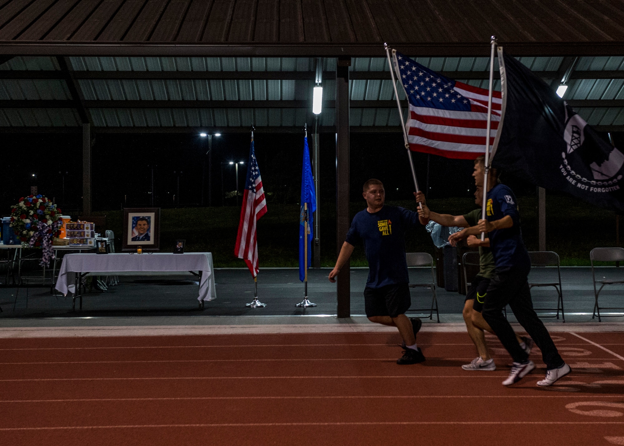 The 7th annual Air Force Sergeants Association Veteran's Vigil run was Nov. 4 and 5, 2016, at the James Gym Track, Scott Air Force Base, Illinois. Master Sgt. Gregory Kuhse was the honoree, who was killed in a British Puma Mk2 helicopter crash in Afghanistan last year. He was a Kalamazoo, Michigan, native and a father of four, with 19 years of service in the United States Air Force. He was assigned to the 3rd Manpower Requirements Squadron at Scott AFB. (U.S. Air Force photo by Staff Sgt. Jodi Martinez)