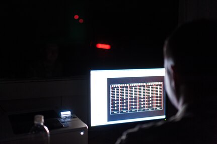 A range safety officer with the 82nd Airborne Division monitors a night fire event from the tower as tracer rounds fly downrange on the second day of the U.S. Army Forces Command Weapons Marksmanship Competition Nov. 8, 2016, at Fort Bragg, N.C. The four-day FORSCOM competition features marksmen from the U.S. Army, U.S. Army Reserve, and the National Guard in events for the M9 pistol, the M4A1 rifle and the M249 SAW, or Squad Automatic Weapon, to recognize Soldiers who are beyond expert marksmen. The multi-tiered events challenge the competitors' ability to accurately and quickly engage targets in a variety of conditions and environments. (U.S. Army photo by Timothy L. Hale/Released)