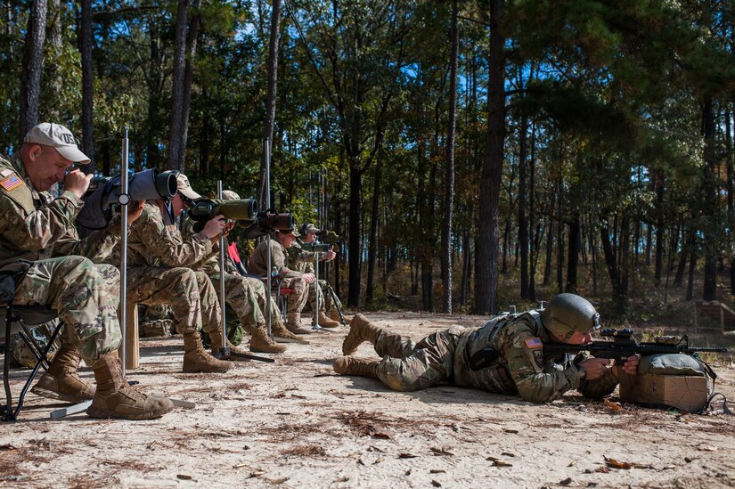 Sgt. Joseph Hall, with the 310th Psychological Operation Company and the U.S. Army Reserve Combat Marksmanship Program, engages targets on the second day of the U.S. Army Forces Command Weapons Marksmanship Competition Nov. 8, 2016, at Fort Bragg, N.C. The four-day FORSCOM competition features marksmen from the U.S. Army, U.S. Army Reserve, and the National Guard in events for the M9 pistol, the M4A1 rifle and the M249 SAW, or Squad Automatic Weapon, to recognize Soldiers who are beyond expert marksmen. The multi-tiered events challenge the competitors' ability to accurately and quickly engage targets in a variety of conditions and environments. (U.S. Army photo by Timothy L. Hale/Released)