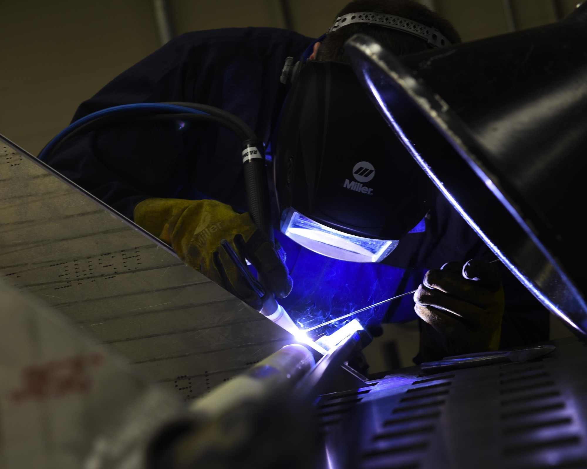 U.S. Air Force Tech. Sgt. Trevor Sutton, 53rd Test Support Squadron Special Devices Flight fabrication section chief, welds a stainless steel section of a custom design at Tyndall Air Force Base, Fla., Nov. 2, 2016. Metals technology technicians like Sutton are experts at welding, fabricating and custom design requests. (U.S. Air Force photo by Airman 1st Class Cody R. Miller/Released)