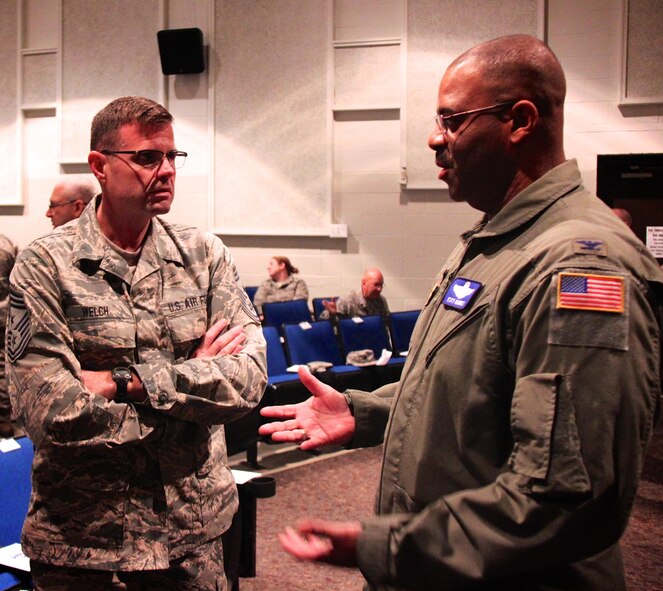 At left, the top enlisted member of the 932nd Airlift Wing, Command Chief Master Sgt. Chad Welch, listens to Col. Esteban Ramirez during a busy training weekend.  Colonel Esteban L. “Esty” Ramirez is the Vice Commander of the 932nd Airlift Wing, Scott Air Force Base, Ill, on November 6, 2016.  The wing flies the C-40C aircraft and is the premier distinguished visitor airlift operation in the Air Force Reserve Command.  With over 1000 members, the wing equips, trains and organizes a ready force of Citizen Airmen to support and maintain all facets of air base operations involving infrastructure and security.  Executing the mission is made possible by Airmen from four groups which include 932nd Mission Support Group, 932nd Maintenance Group, 932nd Operations Group and the 932nd Medical Group.  (U.S. Air Force photo by Lt. Col. Stan Paregien)