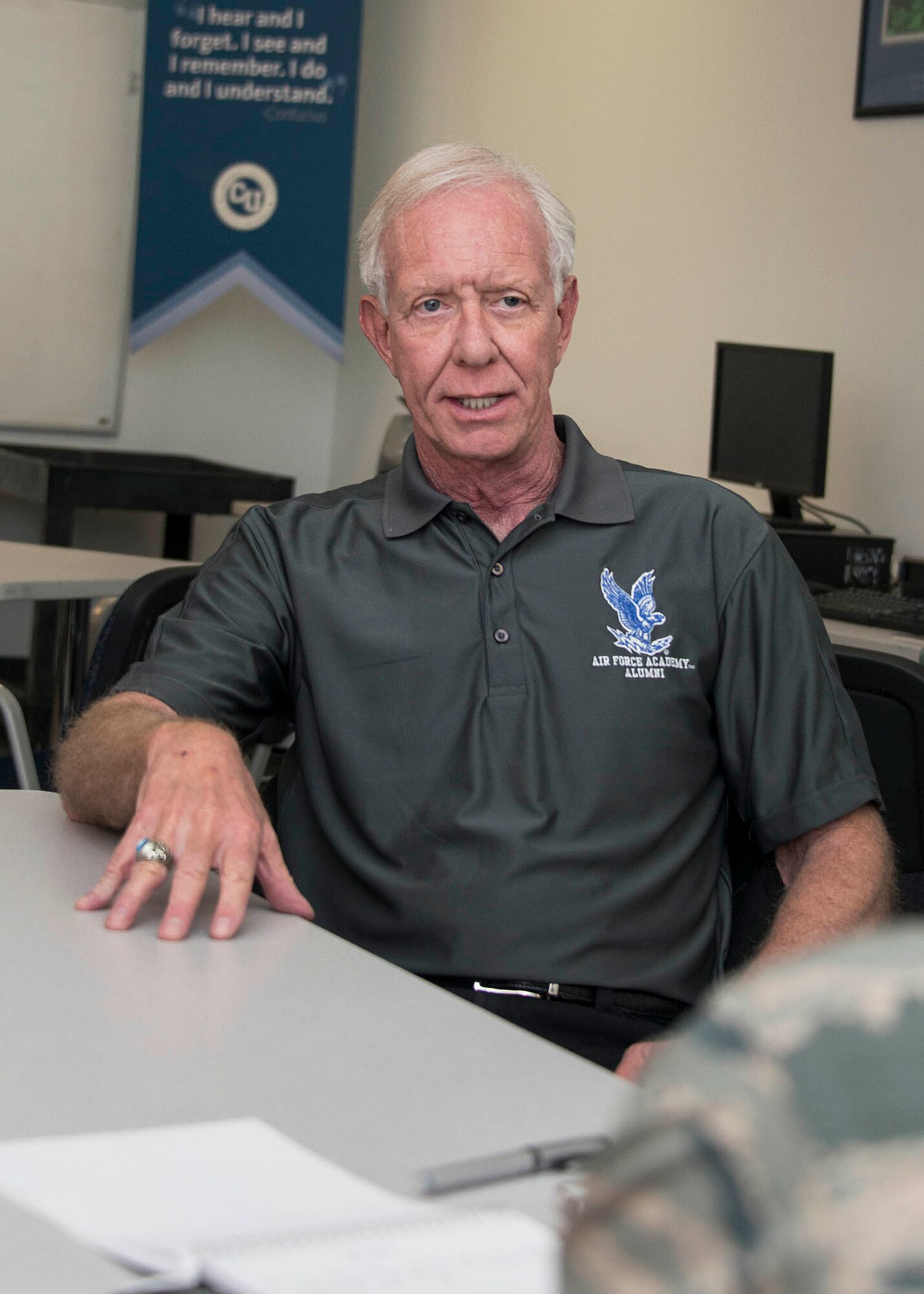 Capt. Chesley "Sully" Sullenberger sits down for an interview with 2nd Lt. Sarah Johnson, 60th Air Mobility Wing Public Affairs Nov. 5, 2016 during a visit at Travis Air Force Base, Calif. Sullenberger became a national hero in 2009 when he landed a damaged Airbus A320 passenger jet in the Hudson River. During his visit, Sullenberger met with more than 500 Airmen and their families. (US Air Force Photo by T.C. Perkins Jr.)