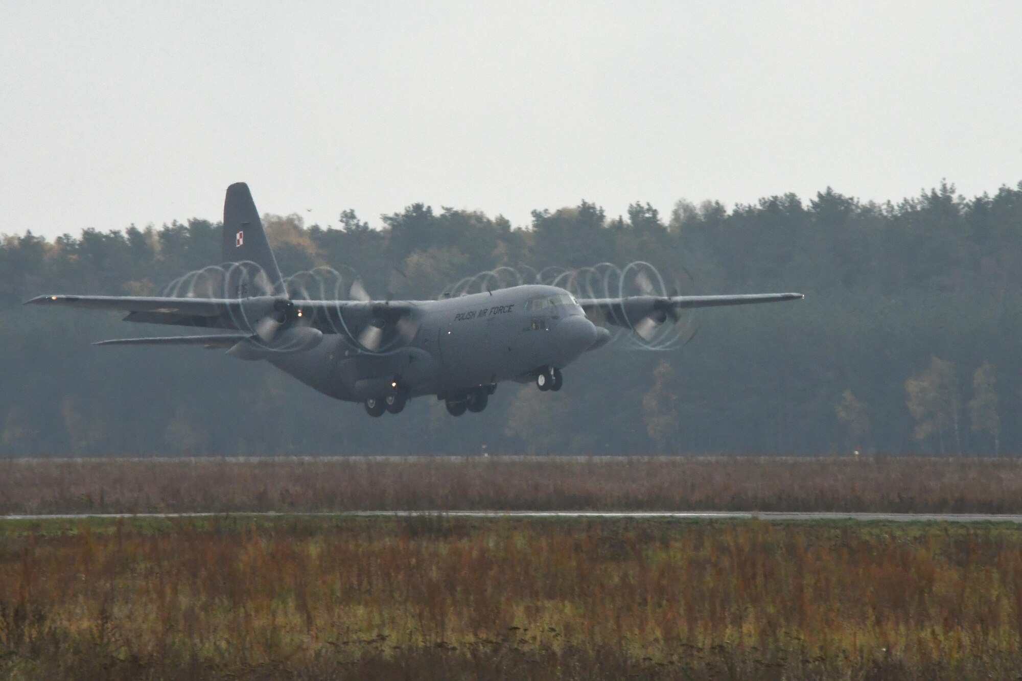 A Polish C-130E Hercules takes off at Powidz Air Base, Poland, on Oct. 26, 2016. Members of the 94th Airlift Wing, Dobbins Air Reserve Base, Ga., and the 86th Airlift Wing, Ramstein Air Base, Germany, trained with the Polish air force during Aviation Detachment 17-1 in support of Operation Atlantic Resolve, Oct. 3-28. (U.S. Air Force photo by Staff Sgt. Alan Abernethy)