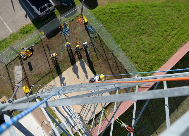 Certified climbing instructors host training attended by Beale leadership Nov. 8, 2016 at Beale Air Force Base, California. The 100 foot tower serves as a place to certify and recertify Airmen who climb as a part of their job. (U.S. Air Force photo/Airman Tristan D. Viglianco)