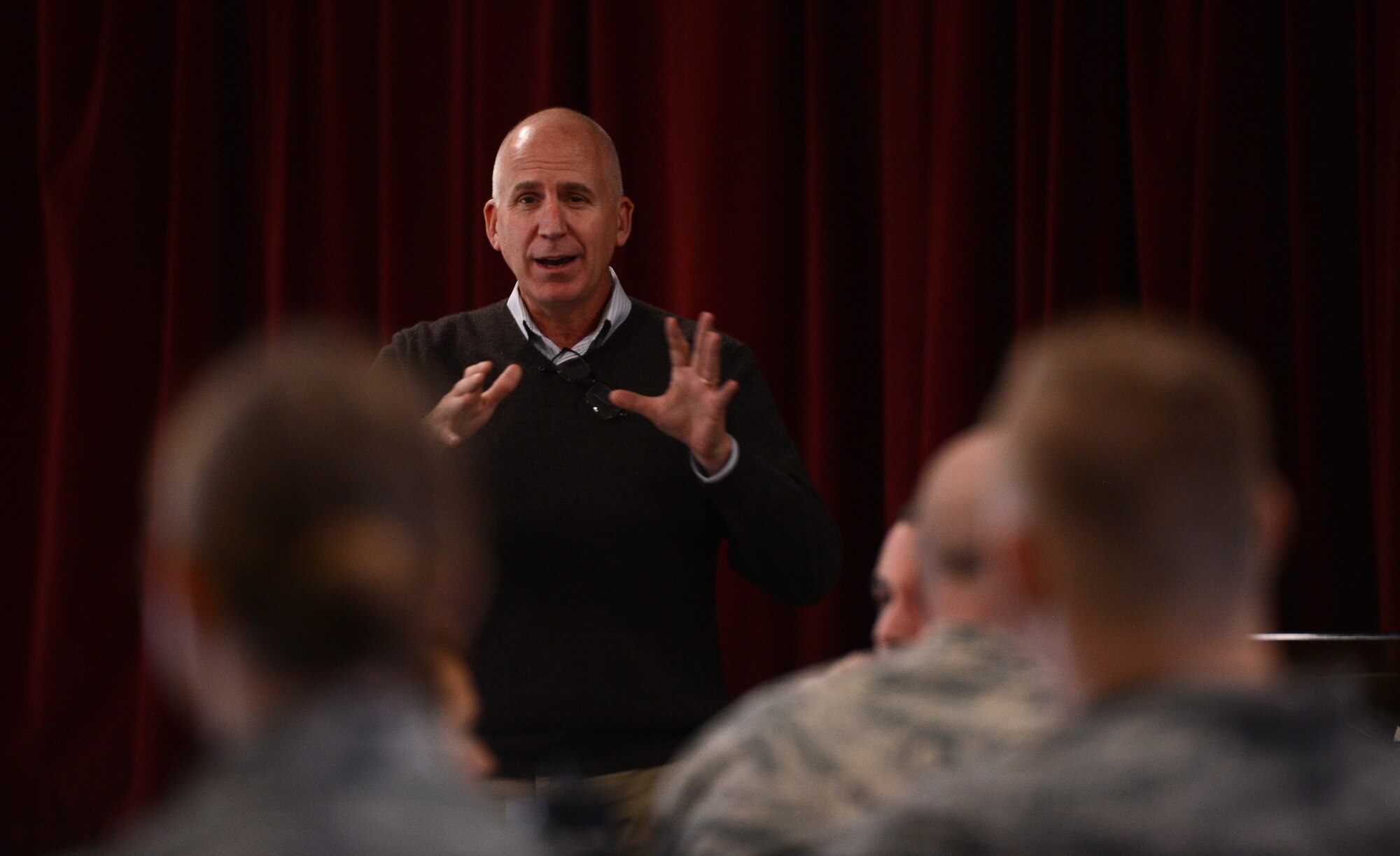 Retired Chief Master Sgt. Cary Hatzinger teaches leadership principles at a Lunch and Leadership Lecture Nov. 4, 2016, at Joint Base Lewis-McChord, Wash. The next Lunch and Leadership Lecture is scheduled for Friday Dec. 2 at the McChord Chapel Support Center. (U.S. Air Force photo/Senior Airman Jacob Jimenez) 