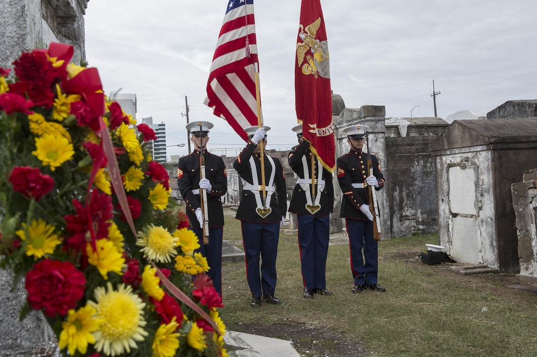 Marines from Marine Forces Reserve present the colors during a wreath-laying ceremony for Major Daniel Carmick at St. Louis Cemetery No. 2 here, Nov. 9, 2016. The Marine Corps visits Carmick’s gravesite annually to conduct a wreath laying ceremony and commemorate his heroic actions.  Carmick led Marines during the Battle of New Orleans in the War of 1812, helping to repel the British forces attempting to take the city. (U.S. Marine Corps photo by Sgt. Sara Graham/released)