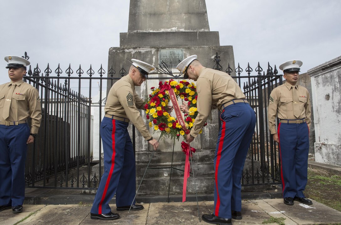 Colonel Derrick Heyl, Commanding Cfficer of Headquarters Battalion, Marine Forces Reserve, and Sergeant Major Michael J. Rowan, Sergeant Major of Headquarters Battalion, Marine Forces Reserve, place a wreath at Major Daniel Carmick’s final resting place at St. Louis Cemetery No. 2 in here, Nov. 9, 2016. The Marine Corps visits Carmick’s gravesite annually to conduct a wreath laying ceremony and commemorate his heroic actions.  Carmick led Marines during the Battle of New Orleans in the War of 1812, helping to repel the British forces attempting to take the city. (U.S. Marine Corps photo by Sgt. Sara Graham/released) 