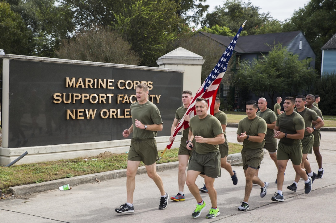 Colonel Derrick Heyl, Commanding Officer of Headquarters Battalion, Marine Forces Reserve, and Sergeant Major Michael J. Rowan, Sergeant Major of Headquarters Battalion, lead Marines from Marine Forces Reserve on a motivational run around the facility and local neighborhood here, on Nov. 9, 2016. The run celebrated the 241st Marine Corps birthday – the day that commemorates the beginning of the Marine Corps and is when all Marines reflect on their history and the special bond that they have with one another. (U.S. Marine Corps photo by Cpl. Melissa Martens/ Released)  