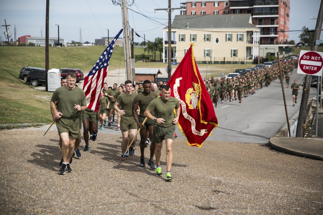 Marines from Marine Forces Reserve run during a 3-mile motivational formation run here, Nov. 9, 2016. Each year, the Marines celebrate the Corps’ birthday with a cake-cutting ceremony followed by a run. Since Nov. 10, 1775, the United States Marine Corps has earned the reputation as the world's most effective expeditionary fighting force – engaging in combat on battlefields across the globe. (U.S. Marine Corps photo by Cpl. Gabrielle Quire)