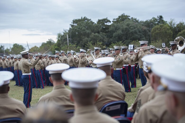 Marines from Marine Forces Reserve listen to Marine Corps Band New Orleans during the 241st Marine Corps birthday celebration here, Nov. 9, 2016. Each year, Marines celebrate the Corps’ birthday with a cake-cutting ceremony followed by a run. Since Nov. 10, 1775, the United States Marine Corps has earned the reputation as the world's most effective expeditionary fighting force – engaging in combat on battlefields across the globe. (U.S. Marine Corps photo by Sgt. Sara Graham)