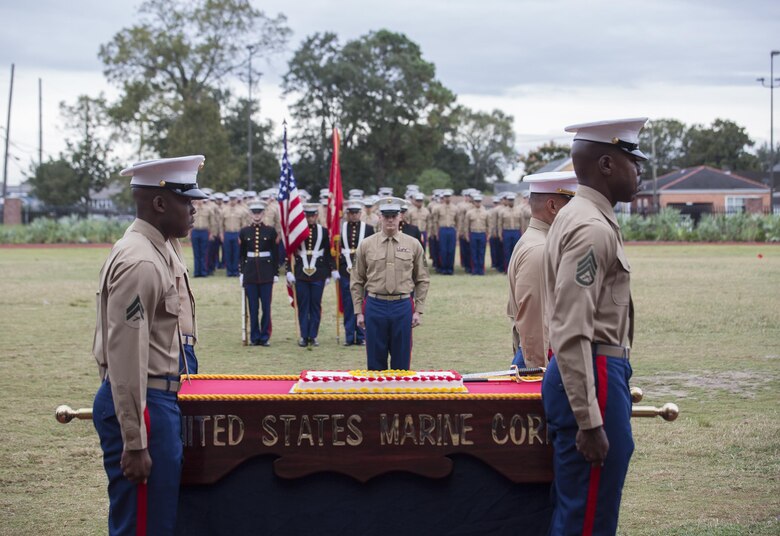 Marines from Marine Forces Reserve carry out the cake during the 241st Marine Corps birthday celebration here, Nov. 9, 2016. Each year, the Marines celebrate the Corps’ birthday with a cake-cutting ceremony followed by a run. Since Nov. 10, 1775, the United States Marine Corps has earned the reputation as the world's most effective expeditionary fighting force – engaging in combat on battlefields across the globe. (U.S. Marine Corps photo by Sgt. Sara Graham)