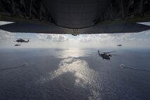 HH-60 Pave Hawks from 33rd Rescue Squadron and Japan Air Self-Defense Force, fly in formation behind an MC-130J from the 17th Special Operations Squadron preparing to be refueled during exercise Keen Sword 17, Nov. 7, 2016, near Okinawa, Japan. The U.S.-Japan alliance remains strong and productive through both countries’ shared commitment to a full range of military capabilities. Not only do we share common values and common concerns, we face common threats. (U.S. Air Force photo by Senior Airman Stephen G. Eigel/released)