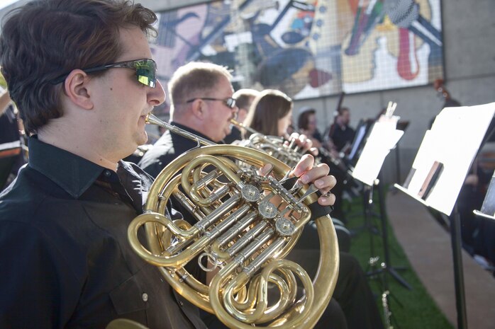 Members for the Henderson Symphony Orchestra play a melody of military songs during the City of Henderson, Nev. Veterans Day celebration, Nov. 5.   Henderson was founded in defense of the U.S. during World War II and continues to recognize military men, women and families for their sacrifice and devotion to the principles of freedom.  (U.S. Air Force photo by Lawrence Crespo)