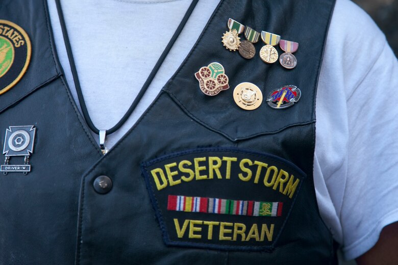 A Desert Storm veteran proudly displays his earned service medals during the City of Henderson, Nev. Veterans Day celebration, Nov. 5.  Veterans Day recognizes all Airmen, Soldiers, Marines, Sailors and Coast Guardsmen who served the United States selflessly. (U.S. Air Force photo by Lawrence Crespo)