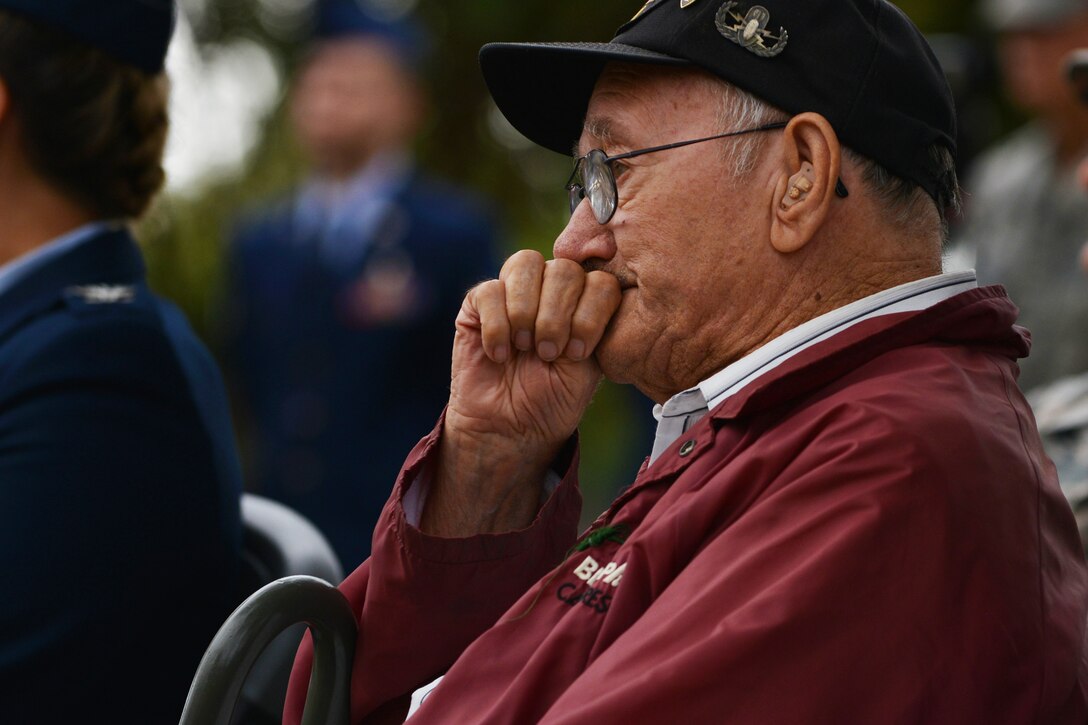 World War II veteran Allen Ordorff listens as a fellow veteran shares his story of being captured as a prisoner of war during the Vietnam War during a ceremony at Joint Base Langley-Eustis, Va., Sept. 16, 2016. Orndorff volunteered to serve at 17, and separated from the military at the rank of technical sergeant. Air Force photo by Staff Sgt. Natasha Stannard