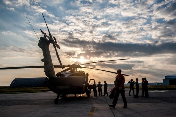 U.S. Air Force Airmen prepare to board an HH-60G Pave Hawk helicopter assigned to the 33rd Rescue Squadron during exercise Keen Sword (KS) 17, Nov. 4, 2016, on Kadena Air Base, Japan. KS is a regularly scheduled exercise which strengthens U.S.-Japan military interoperability and meets mutual defense objectives.  (U.S. Air Force photo by Senior Airman John Linzmeier)