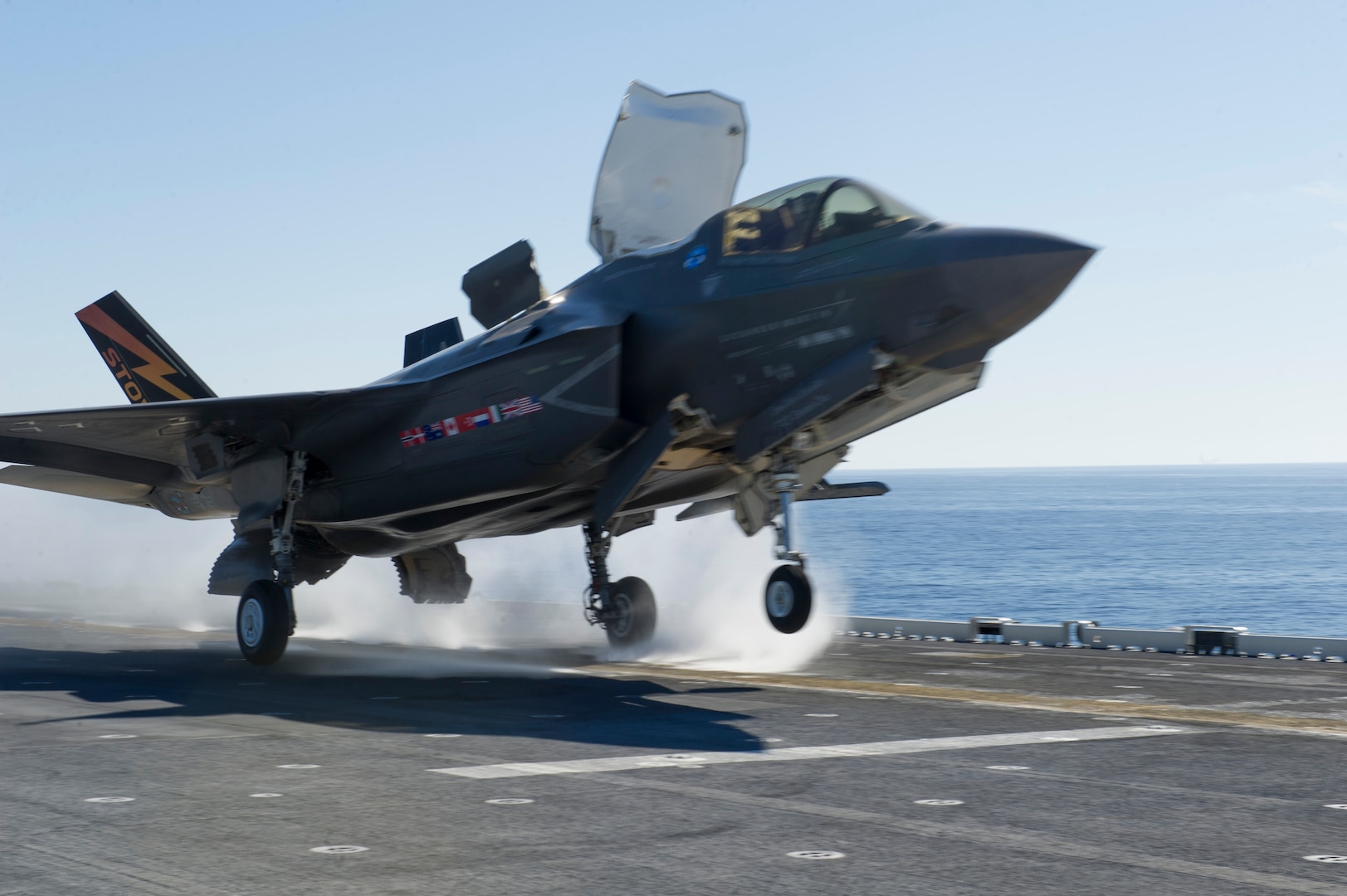 161104-N-VR008-0102 PACIFIC OCEAN (Nov. 4, 2016) An F-35B Lightning II aircraft takes off from the flight deck of amphibious assault ship USS America (LHA 6) during flight operations. The F-35B short takeoff/vertical landing (STOVL) variant is the world’s first supersonic STOVL stealth aircraft. America, with Marine Operational Test and Evaluation Squadron 1 (VMX-1), Marine Fighter Attack Squadron 211 (VMFA-211) and Air Test and Evaluation Squadron 23 (VX-23) embarked, are underway conducting operational testing and the third phase of developmental testing for the F-35B Lightning II aircraft, respectively. The tests will evaluate the full spectrum of joint strike fighter measures of suitability and effectiveness in an at-sea environment. (U.S. Navy photo by Petty Officer 3rd Class Kyle Goldberg/Released)