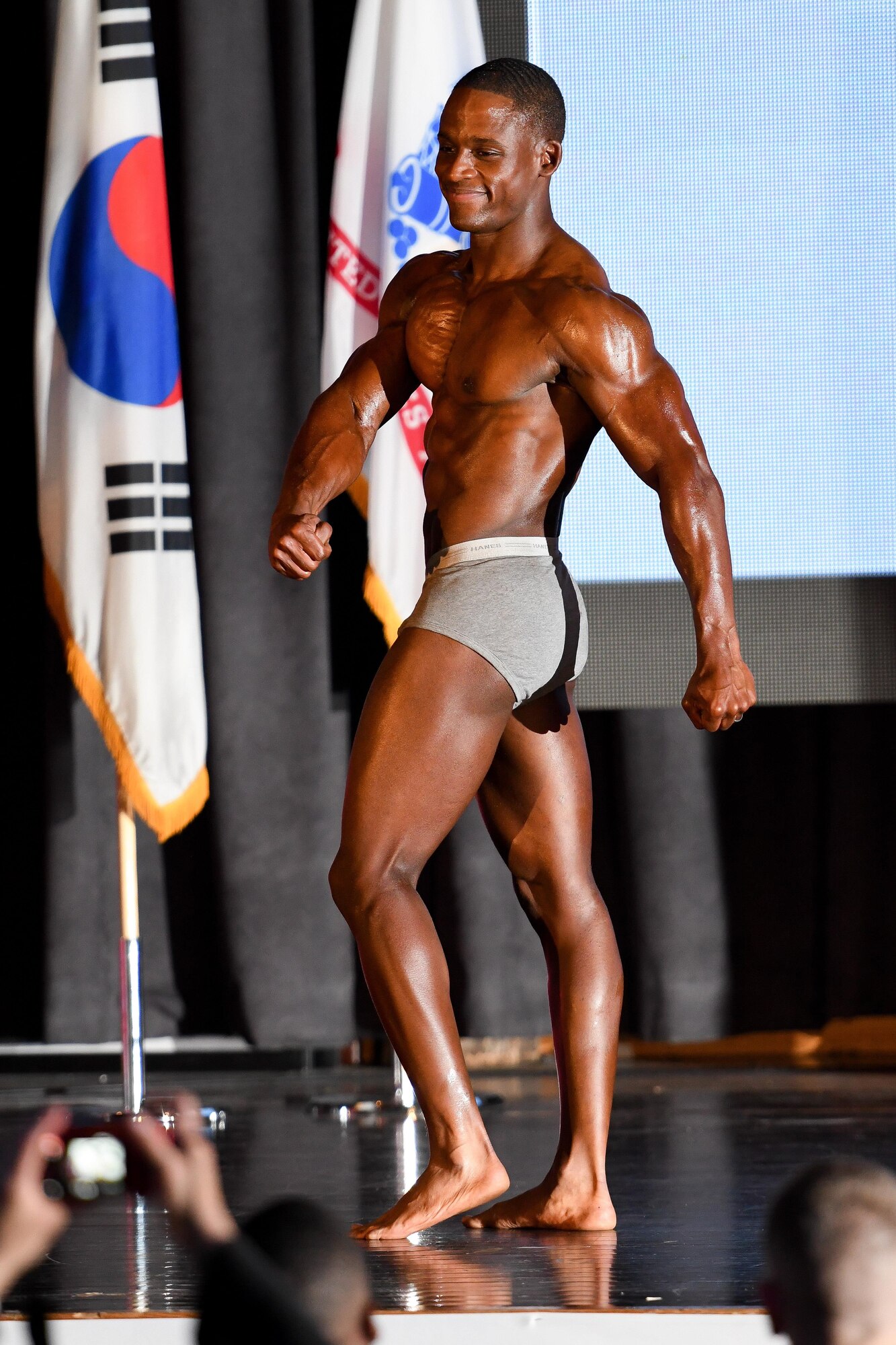 U.S. Army Sgt. Larell Travis poses during the 2016 Mustang Mania Bodybuilding Competition on Osan Air Base, Republic of Korea, Nov. 5, 2016. Travis won the lightweight bodybuilding category during the competition. (U.S. Air Force photo by Staff Sgt. Jonathan Steffen