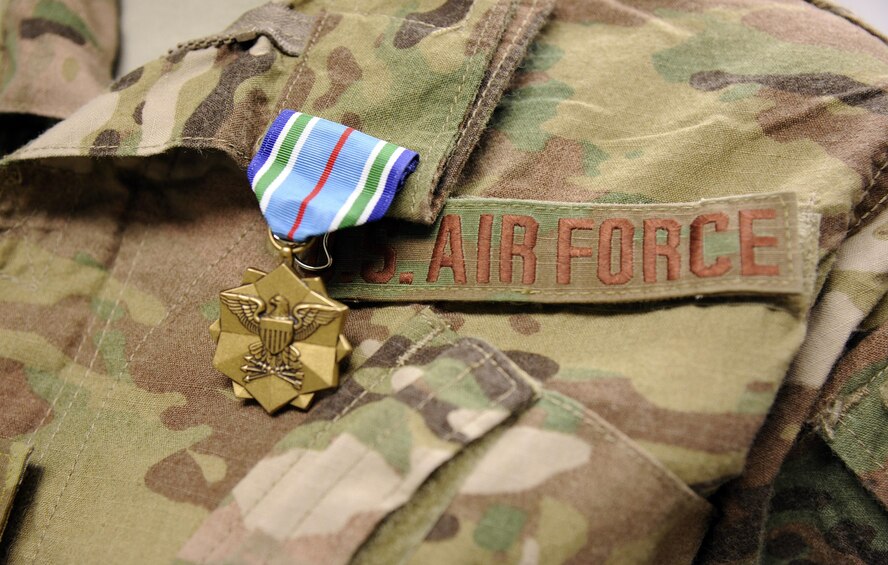 A Joint Service Achievement Medal is pinned on the uniform of one of ten mobile field surgical team Airmen assigned to the 379th Expeditionary Medical Operations Squadron to earn the award Nov. 2, 2016, at Al Udeid Air Base, Qatar. The Joint Service Achievement Medal is awarded in the name of the secretary of defense to members of the armed forces of the United States below the grade of O-6 who, while assigned to a joint activity, distinguish themselves by outstanding achievement or meritorious service. (U.S. Air Force photo by Senior Airman Cynthia A. Innocenti)