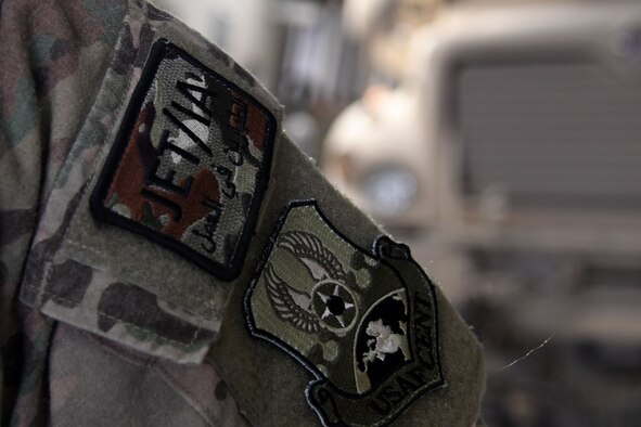 A JET/IA patch is affixed to the uniform of Tech Sgt. Ronald Gowen, a logistician assigned to the 387th Air Expeditionary Squadron. The 387th Air Expeditionary Squadron is responsible for more than 300 Joint Expeditionary Tasking and Individual Augmentee Airmen, who are currently deployed in 10 to 12 countries. (Courtesy photo)
