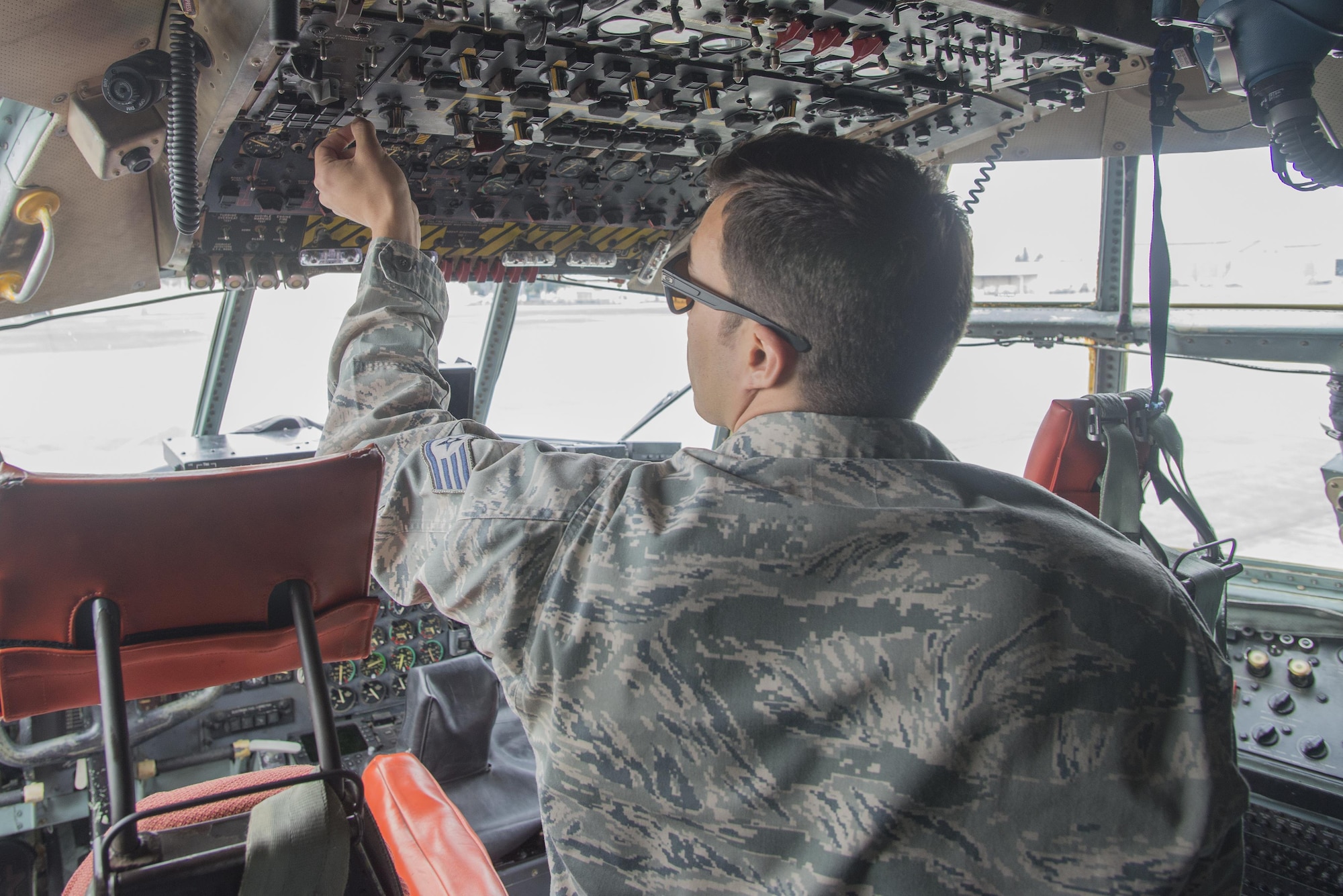 Staff Sgt. Richard Martinez, 374th Maintenance Squadron electrical and environmental journeyman, troubleshoots electrical issues aboard a C-130 Hercules at Yokota Air Base, Japan, Nov. 8, 2016. The electrical and environmental shop is part of the accessories flight which also includes the fuels maintenance and hydraulics shops.  (U.S. Air Force photo by Senior Airman David C. Danford/Released)