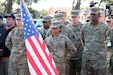 Left to right, U.S. Army Soldiers from the 7th Mission Support Command Col. Tyra Harding, 7th MSC exercise officer in charge, Staff Sgt. Camille Foggy survey team chief, 773rd Civil Support Team, 7th MSC, and Staff Sgt. Joshua Brown, communications NCO, Headquarters and Headquarters Company, 7th MSC, stand in formation during the opening ceremony for the NATO EADRCC Consequence Management Field Exercise "CRNA GORA 2016,” Oct. 31, 2016. 