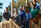 U.S. Air Force Col. Daniel Lasica, 20th Fighter Wing commander, cuts a ribbon with Team Shaw members during the grand opening ceremony for two new cabins at Wateree Recreation Area near Camden, S.C., Nov. 4, 2016. The two new cabins can each host up to eight people and were available to rent as of Nov. 4. (U.S. Air Force photo by Airman 1st Class Kathryn R.C. Reaves)