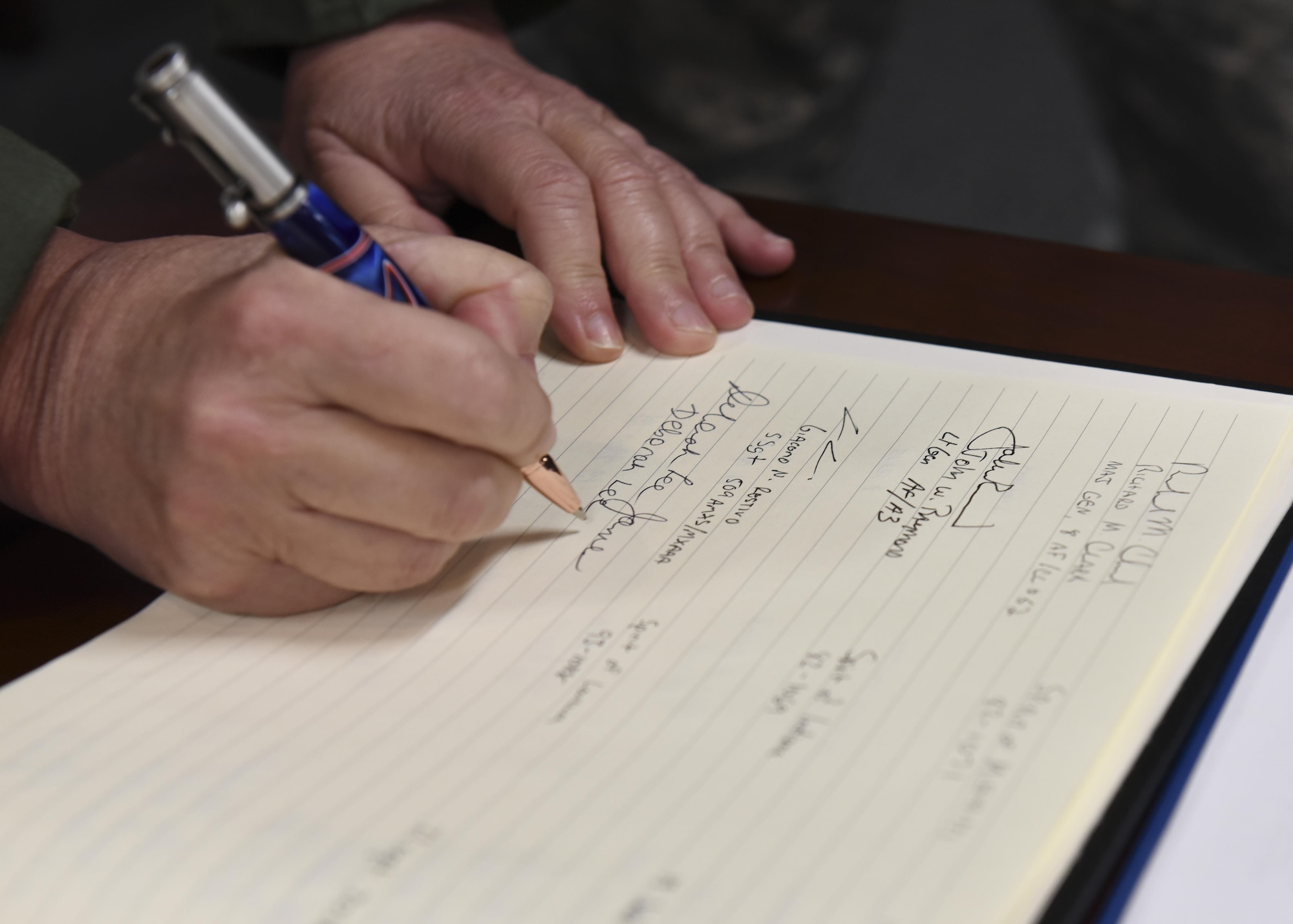 Secretary of the Air Force Deborah Lee James signs a B-2 Spirit log following her flight in a stealth bomber at Whiteman Air Force Base, Mo., Nov. 8, 2016. James had the opportunity to fly in a stealth bomber during her visit to Whiteman and see first-hand Whiteman’s strategic mission.  (U.S. Air Force photo by Senior Airman Danielle Quilla)