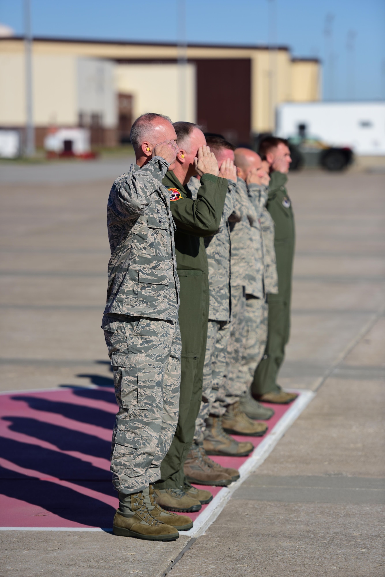 Whiteman Air Force Base leadership salute as Secretary of the Air Force Deborah Lee James departs Whiteman Air Force Base, Mo., Nov. 9, 2016. During her visit to Whiteman, James met with Airmen, flew in a B-2 Spirit and held an all call to discuss her top three priorities and the current state of the Air Force. (U.S. Air Force photo by Senior Airman Joel Pfiester)